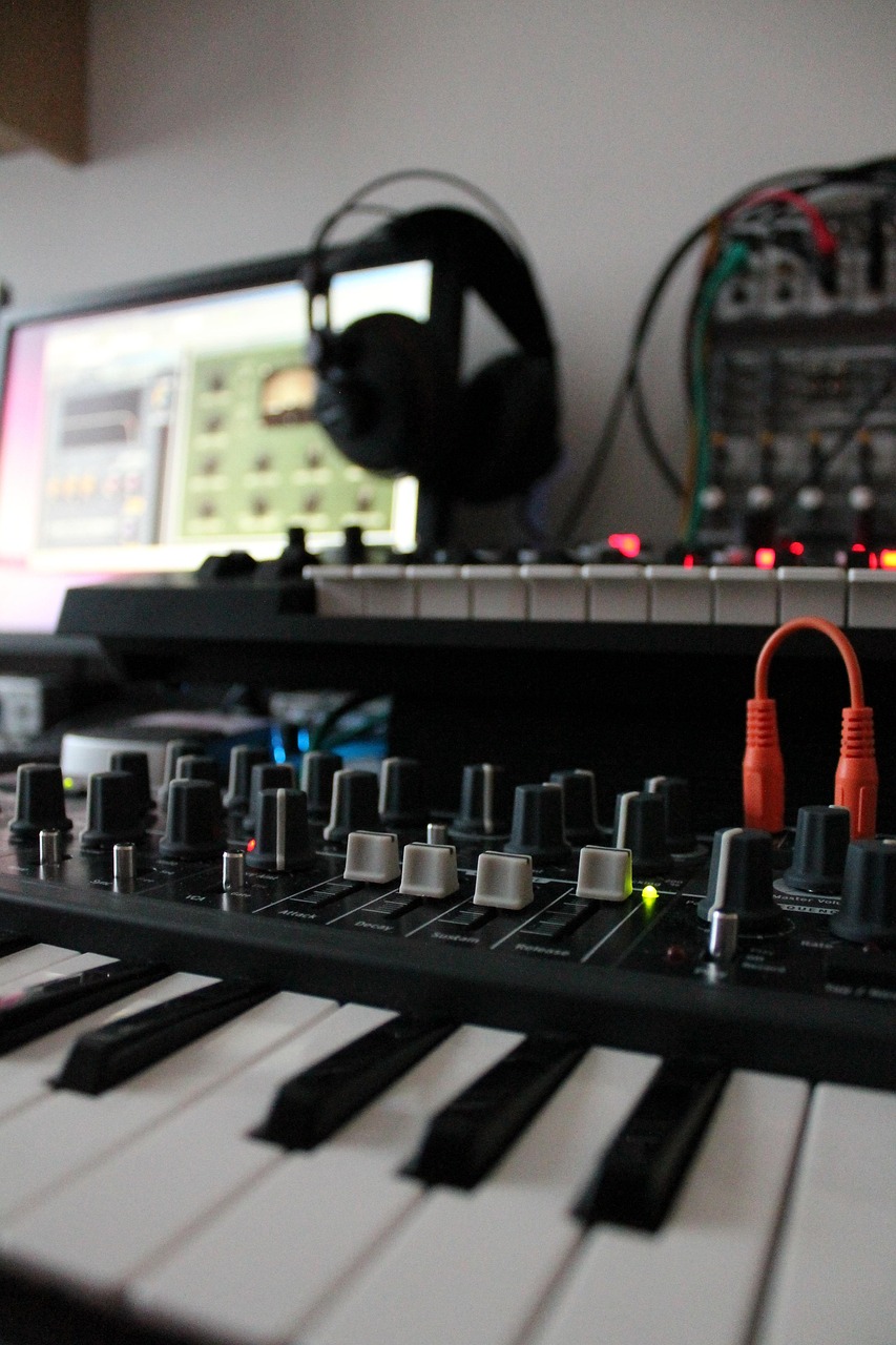 Synth workstation and headphones for MIDI to MP3 SoundFont listening checks