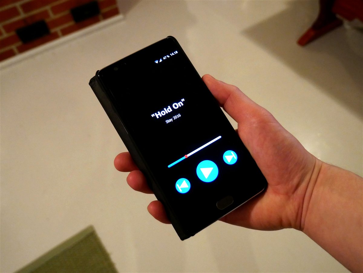 Smartphone music player used to verify OGG to MP3 converter online mobile downloads