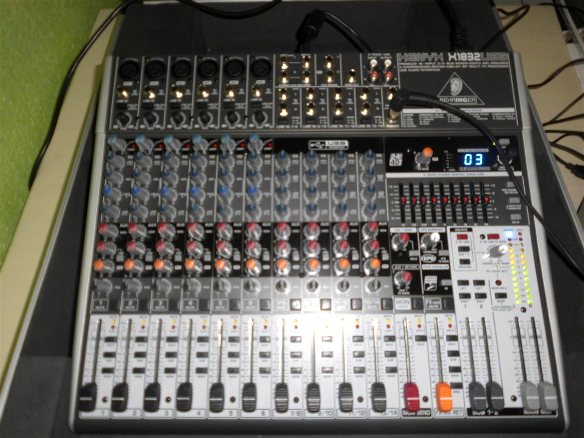 Mixer console used to monitor WMA to MP3 converter online output settings